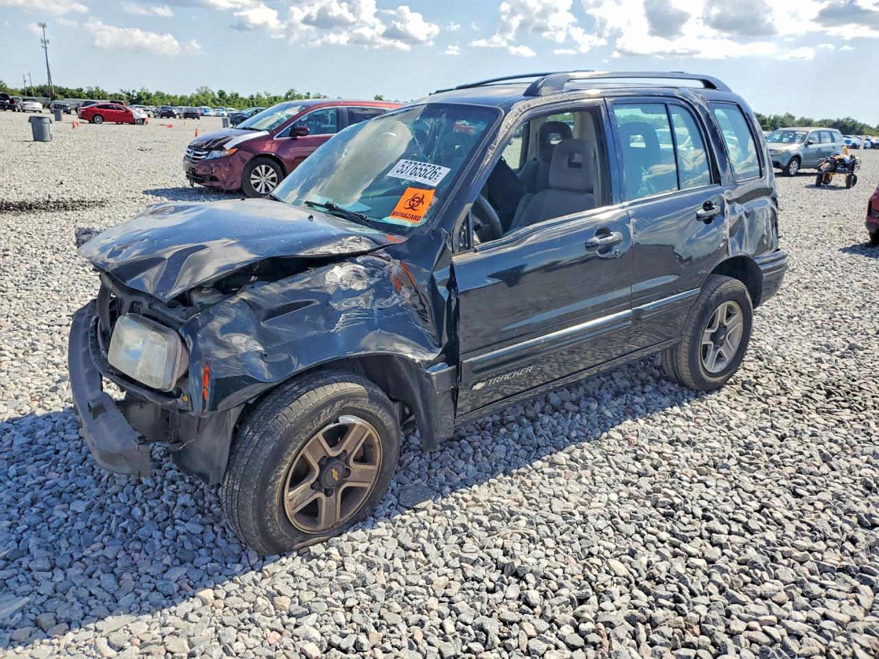 2002 Chevrolet Tracker, VIN 2CNBJ13C826921793 — Rollover