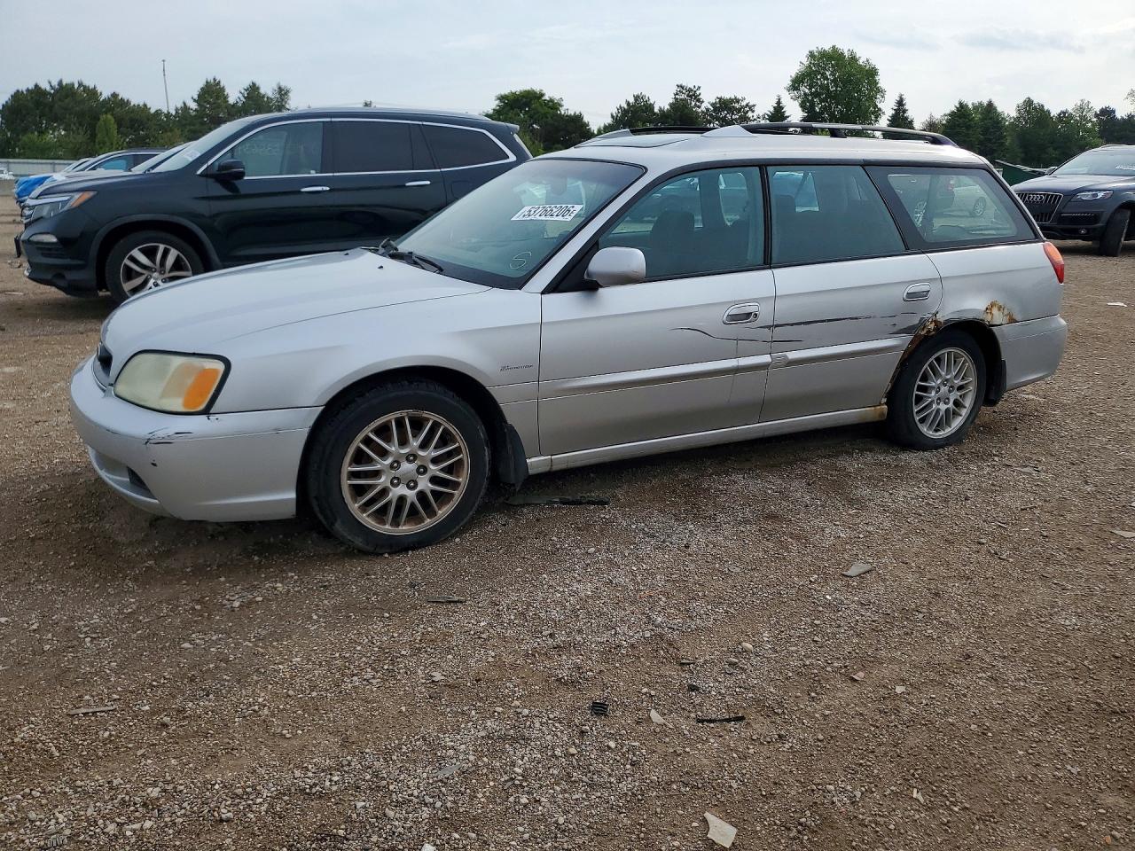 2004 Subaru Legacy L, VIN 4S3BH625047306044 — Зад
