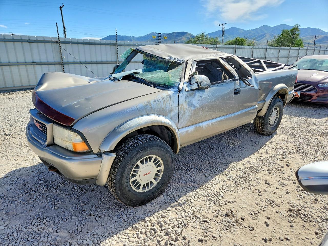 2000 GMC Sonoma SLS 1SJ, VIN 1GTCT19W3Y8124679 — Rollover