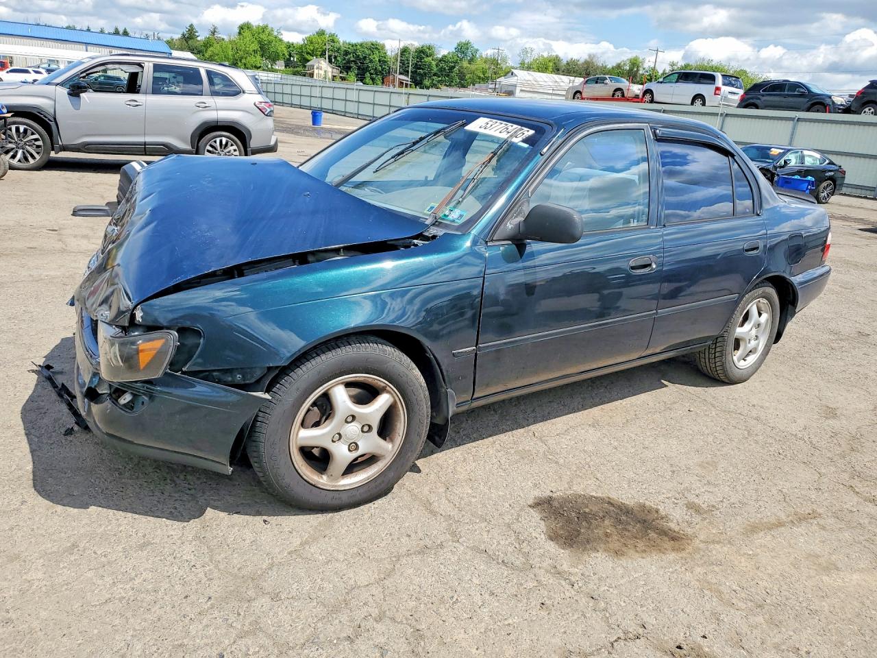1997 Toyota Corolla, VIN 1NXBA02EXVZ634619 — Front end