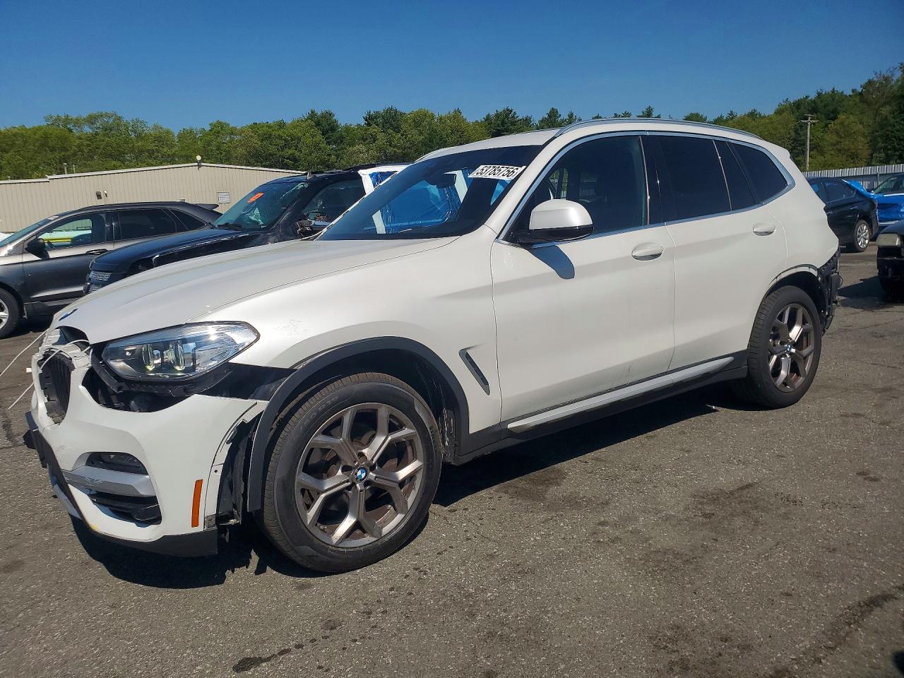 2021 BMW X3 xDrive30i, VIN 5UXTY5C01M9G79312 — Side