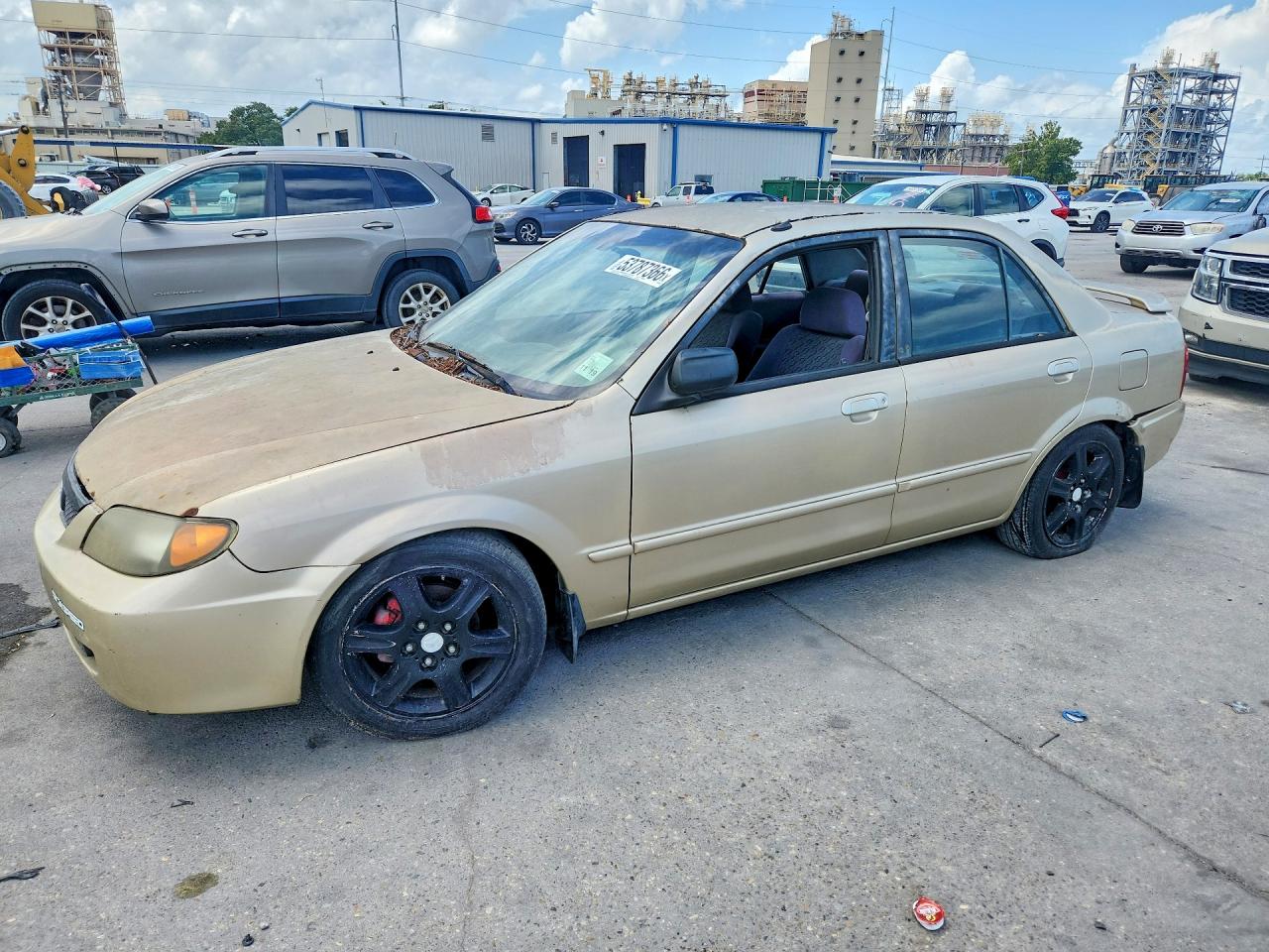 2001 Mazda Protege LX, VIN JM1BJ225310415020 — Бок