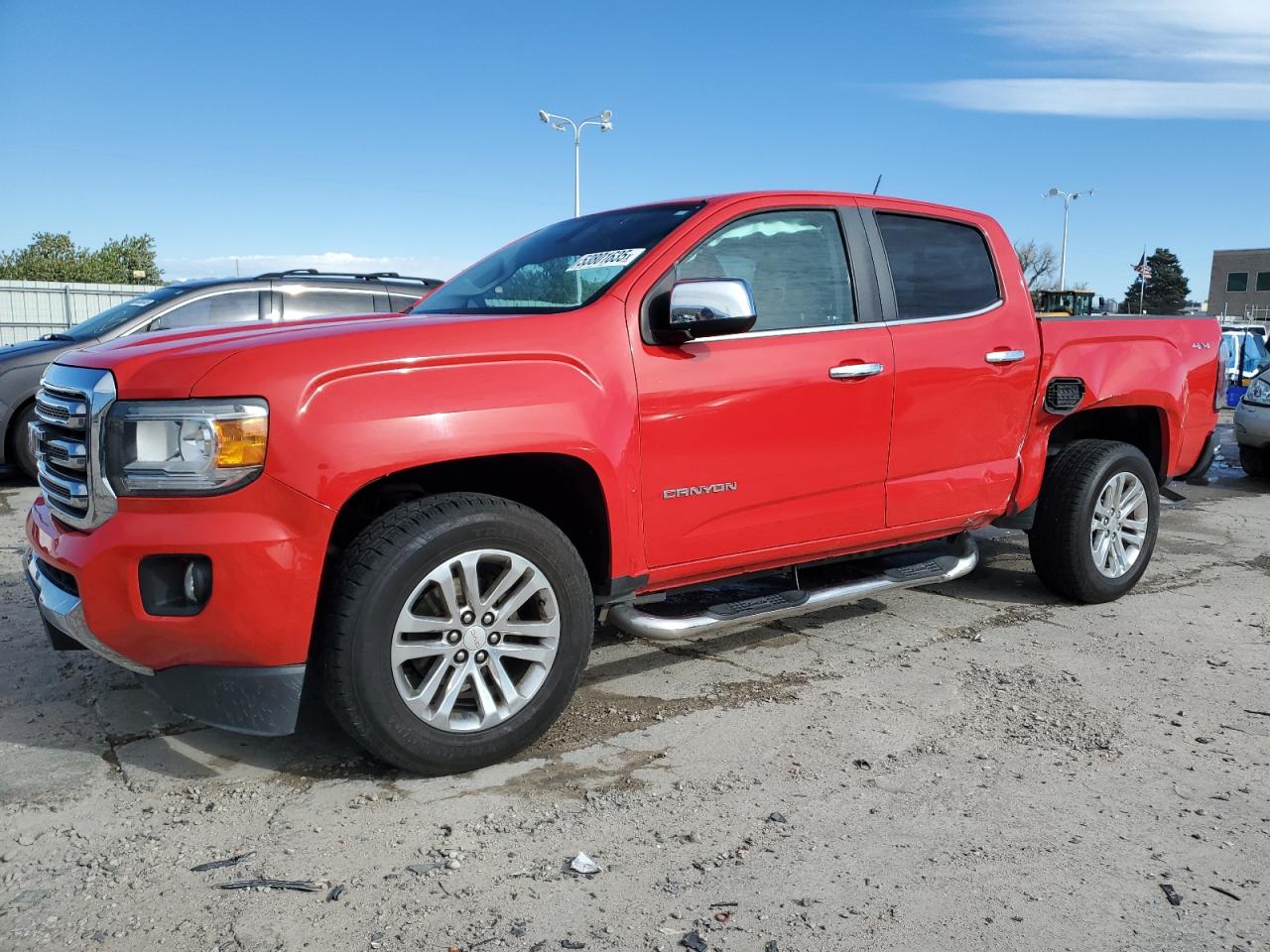 2016 GMC Canyon 4WD SLT, VIN 1GTG6DE35G1117889 — Side