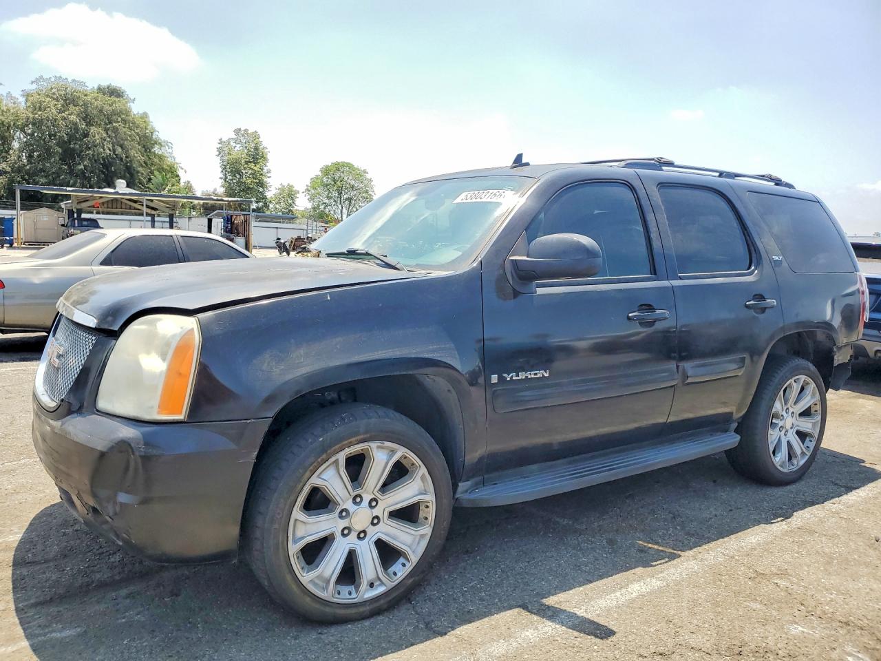 2007 GMC Yukon SLT, VIN 1GKFC13067J386029 — Rear end