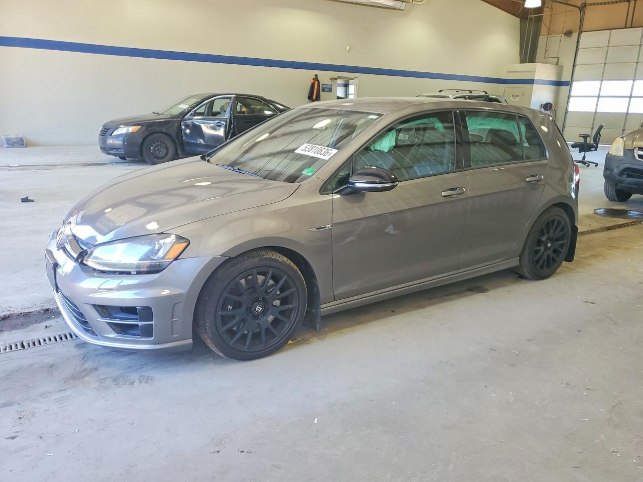 2016 Volkswagen Golf R, VIN WVWLF7AU9GW034354 — Front end