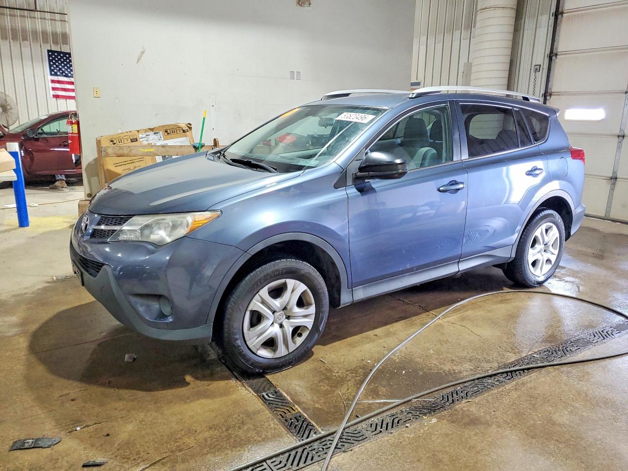 2013 Toyota RAV4 LE, VIN 2T3BFREVXDW075497 — Side