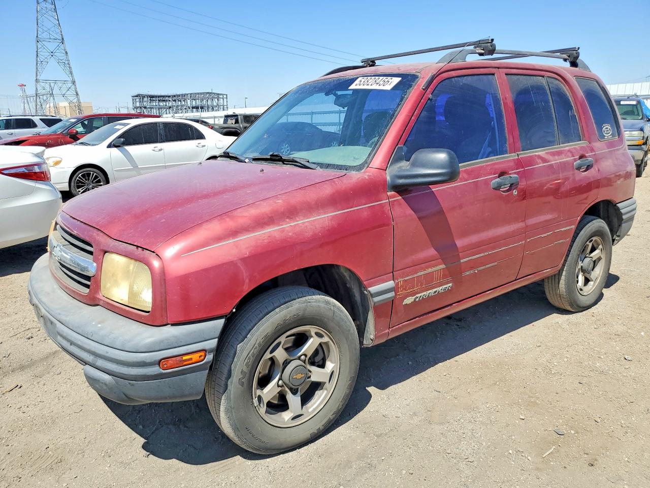 1999 Chevrolet Tracker, VIN 2CNBJ13C9X6912866 — Side