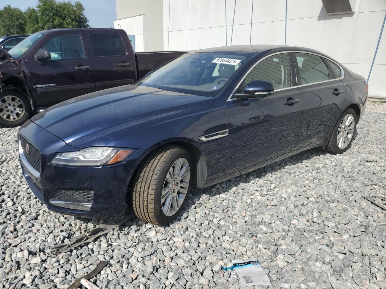 2016 Jaguar XF 35t Premium, VIN SAJBD4BV1GCY14567 — Side