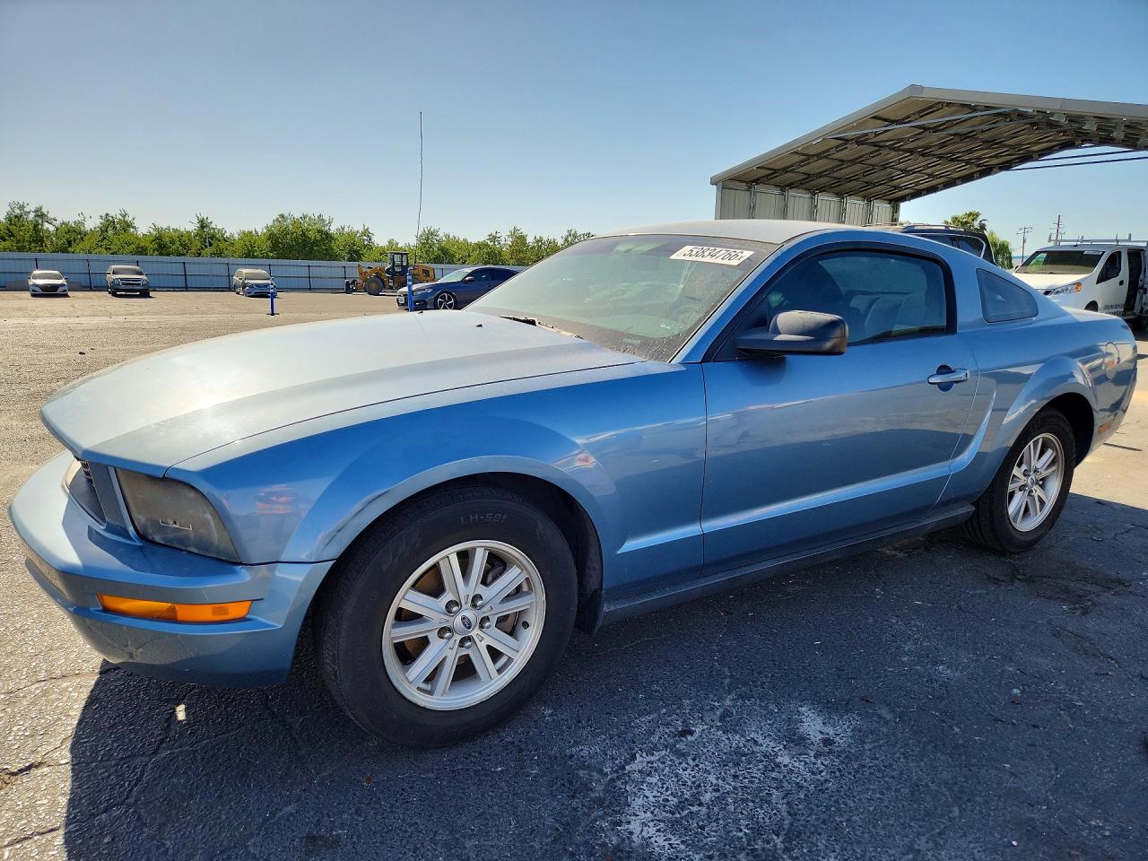 2007 Ford Mustang Deluxe, VIN 1ZVFT80N275271194 — Side