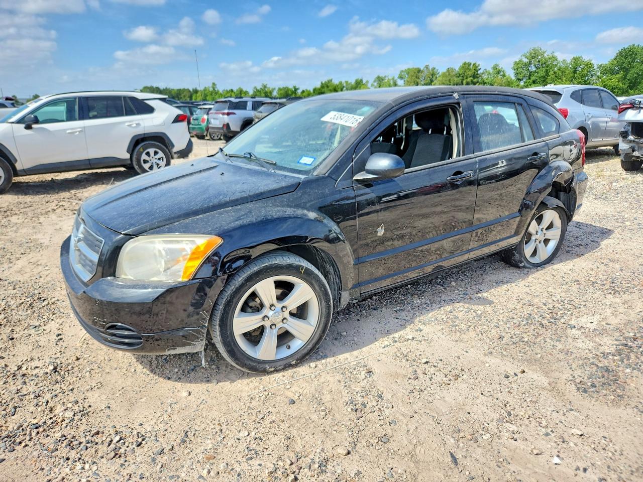2010 Dodge Caliber SXT, VIN 1B3CB4HA8AD635698 — Side