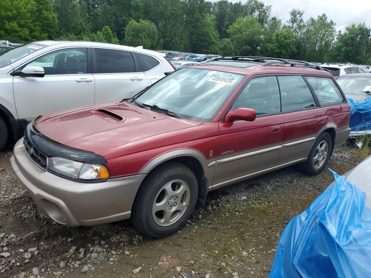 1998 Subaru Legacy Outback, VIN 4S3BG685XW7658948 — Зад