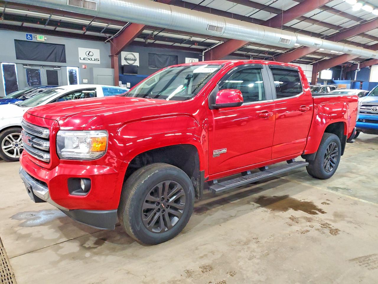 2015 GMC Canyon 4WD SLE, VIN 1GTG6BE34F1180730 — Minor dents and scratches