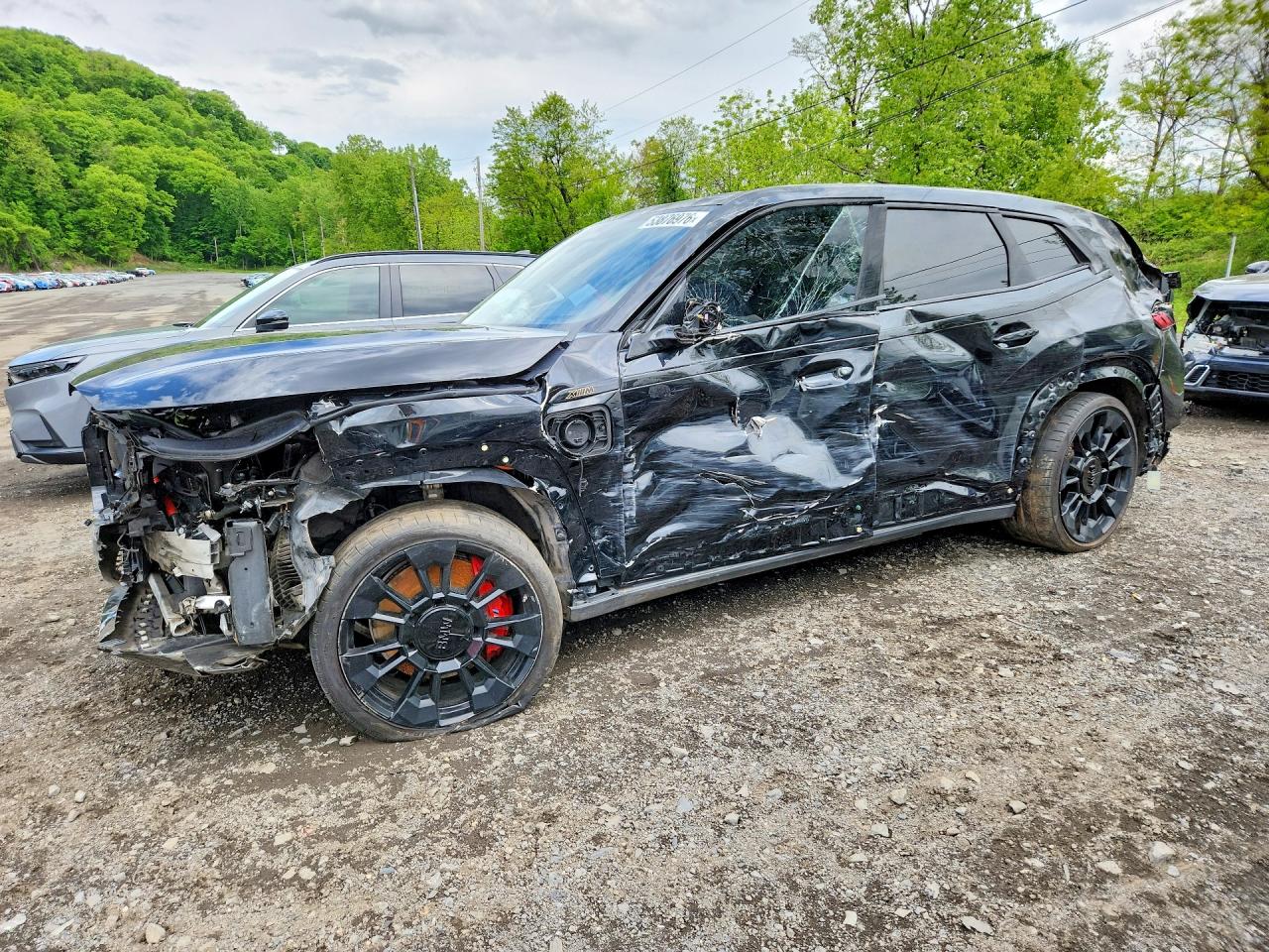 2025 BMW XM, VIN 5YM23CS03S9Z60059 — Rollover