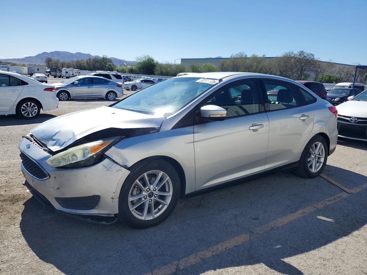 2015 Ford Focus SE, VIN 1FADP3F25FL221548 — Front end