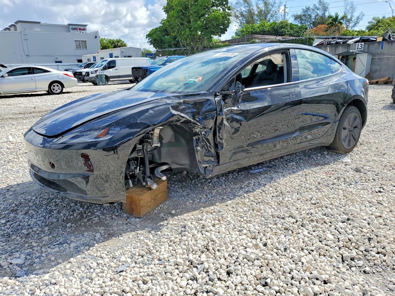 2026 Tesla Model 3 Premium, VIN 5YJ3E1EA7TF167452 — Front end
