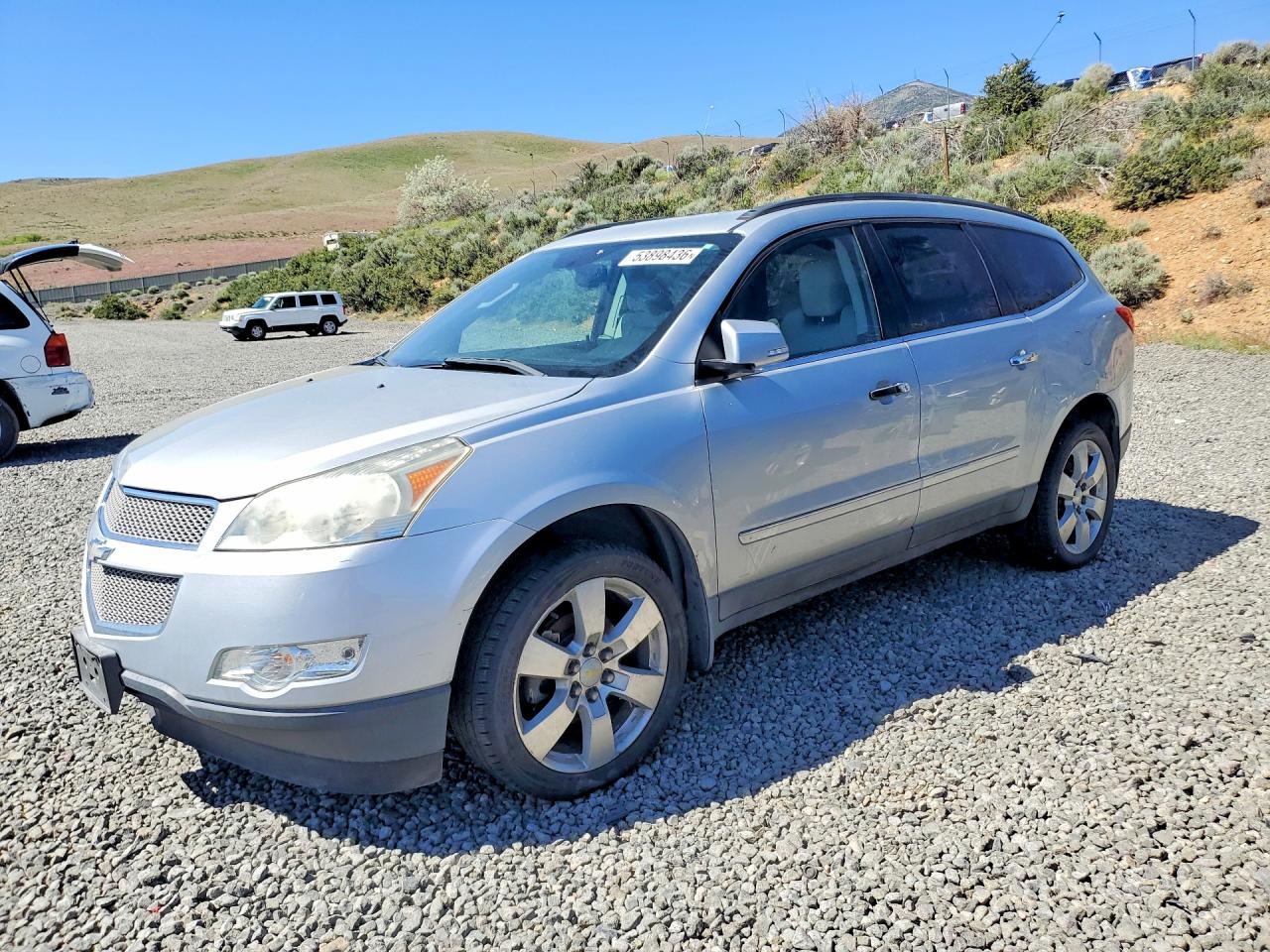 2010 Chevrolet Traverse LTZ, VIN 1GNLVHED6AJ218455 — Мелкие вмятины и царапины