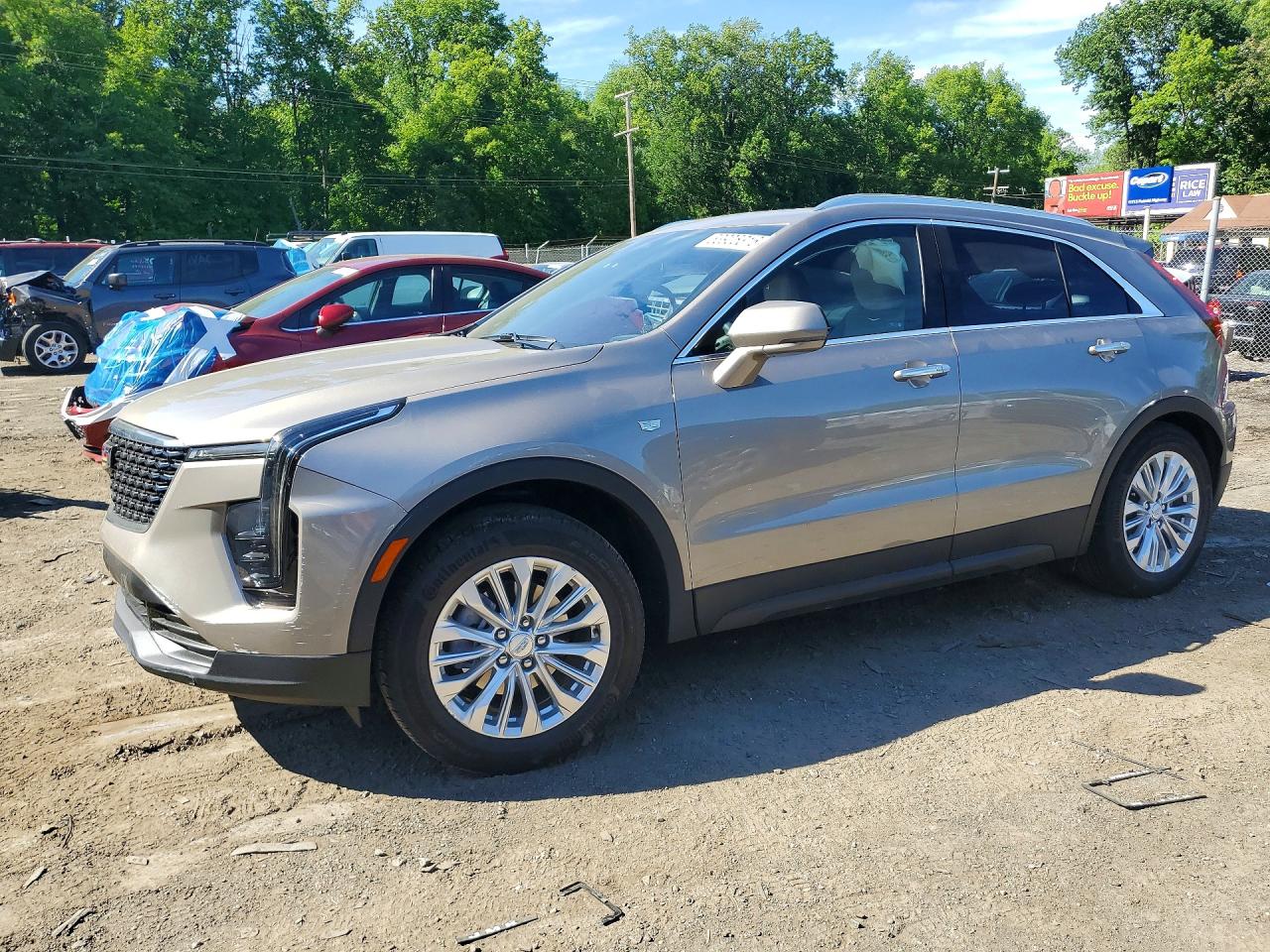2024 Cadillac XT4 AWD Luxury, VIN 1GYFZBR45RF242580 — Side