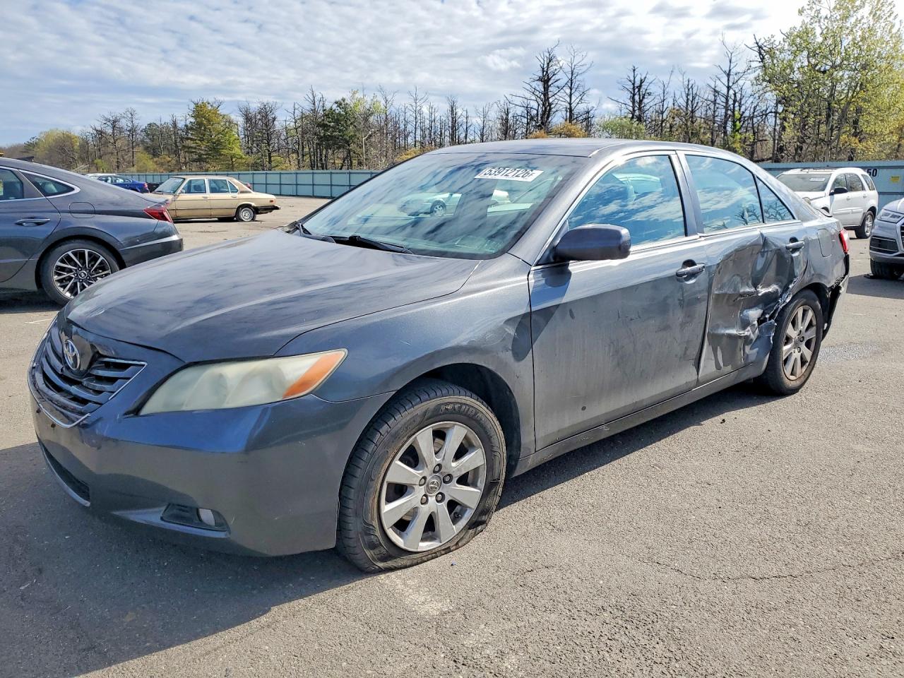 2007 Toyota Camry LE, VIN 4T1BK46K97U512275 — Side