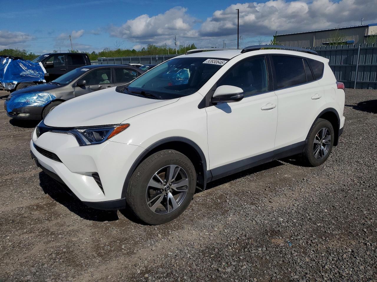 2018 Toyota RAV4 LE, VIN 2T3ZFREV0JW485543 — Minor dents and scratches