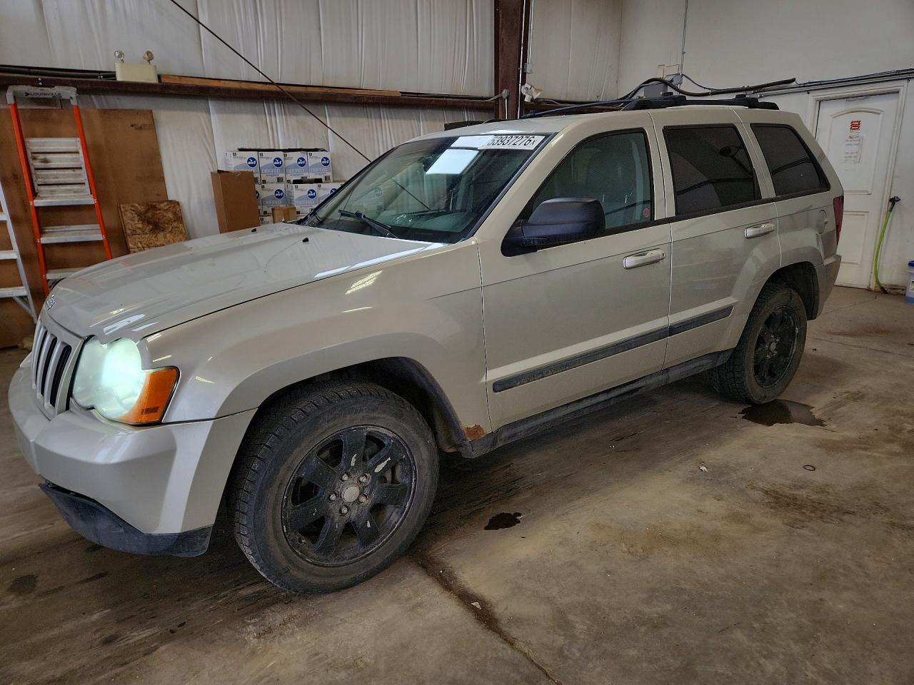 2008 Jeep Grand Cherokee Laredo, VIN 1J8HR48N38C238444 — Rear end