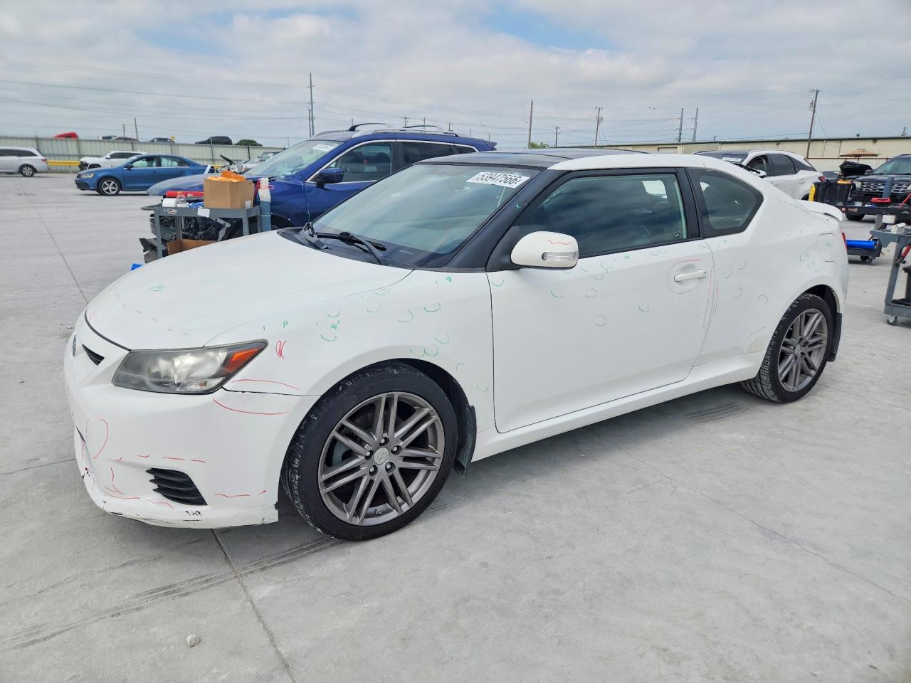 2011 Scion tC, VIN JTKJF5C77B3006980 — Hail