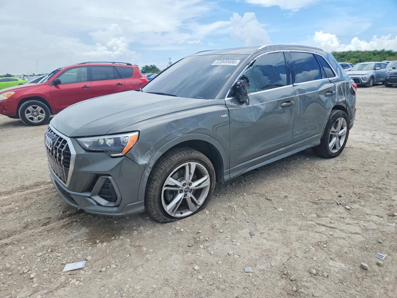 2020 Audi Q3 S line Premium, VIN WA1DECF32L1058349 — Side
