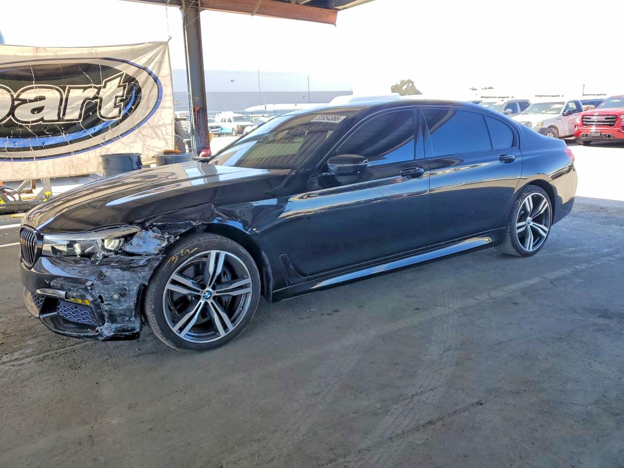 2016 BMW 7 Series 740i, VIN WBA7E2C55GG714661 — Front end