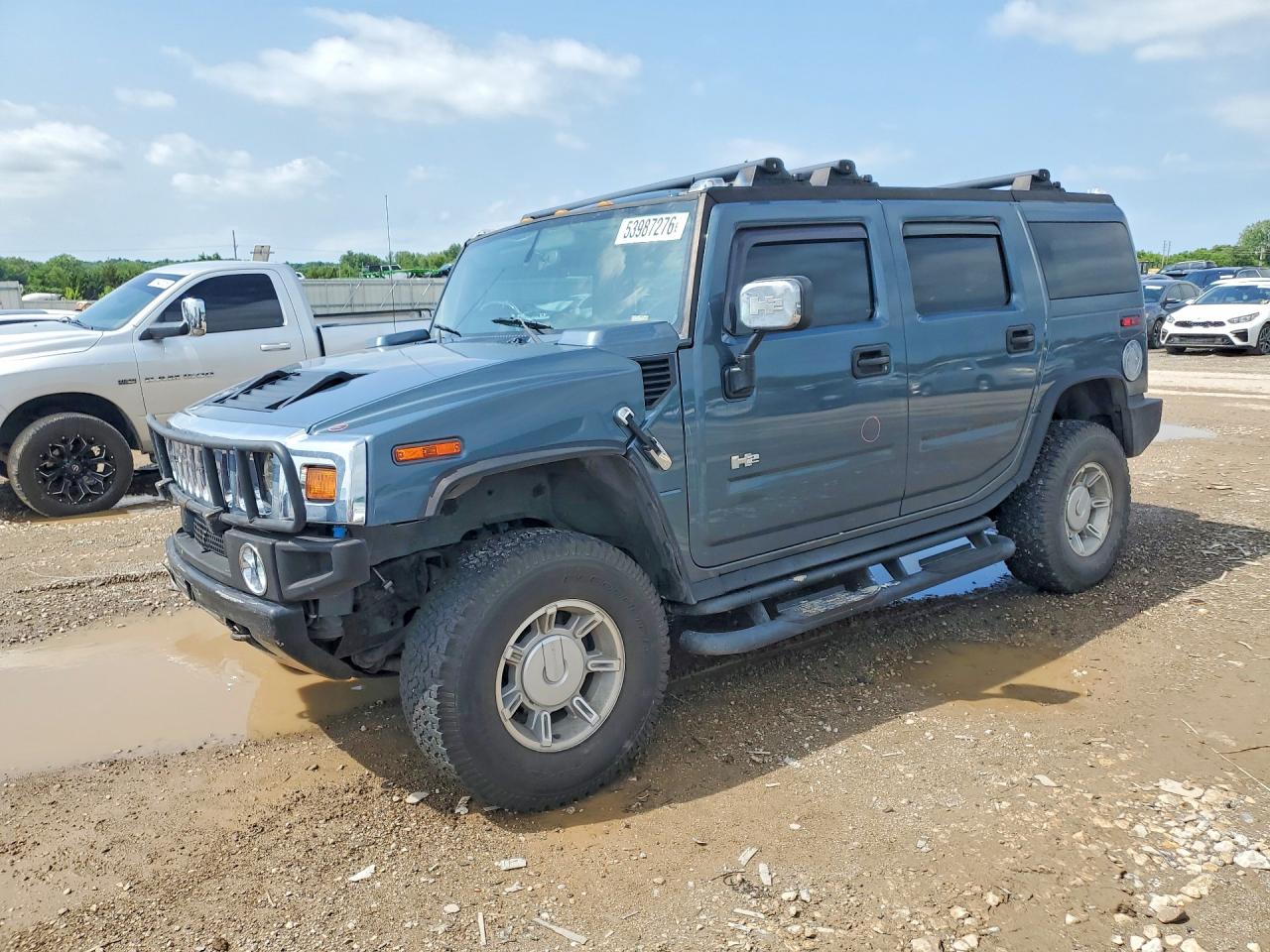 2005 Hummer H2 SUV, VIN 5GRGN23U15H123162 — Мелкие вмятины и царапины