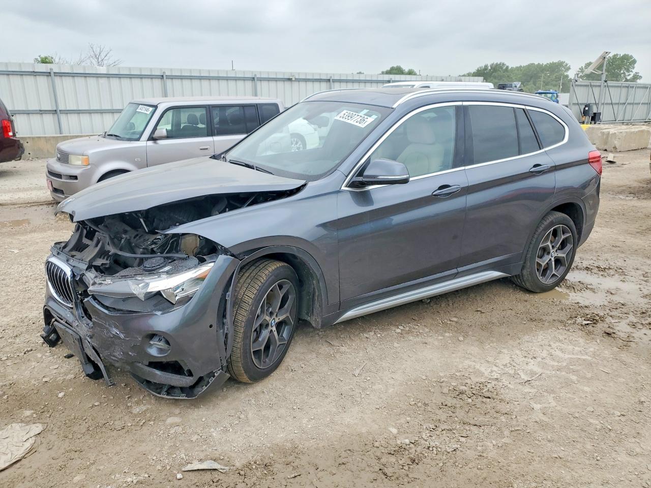 2018 BMW X1 xDrive28i, VIN WBXHT3C38J5L28047 — Front end