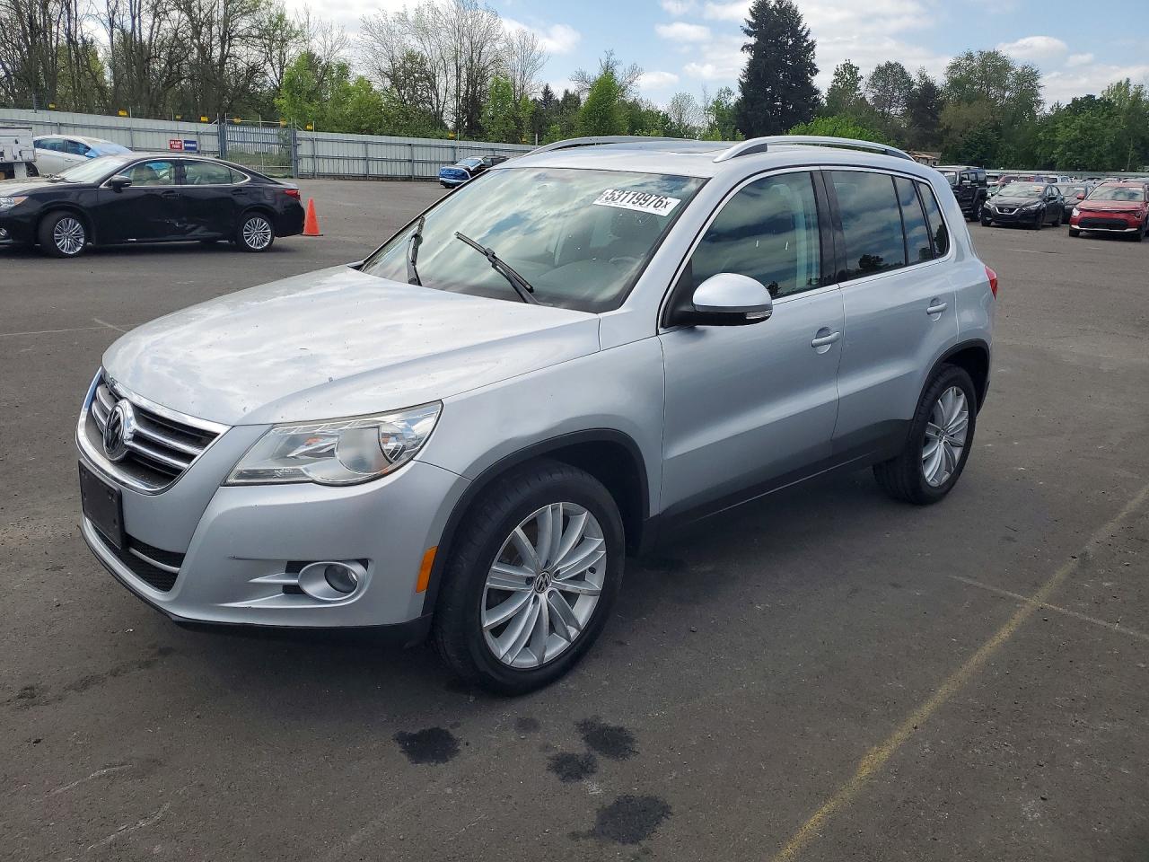 2011 Volkswagen Tiguan S, VIN WVGAV7AX2BW547521 — Prior damage history