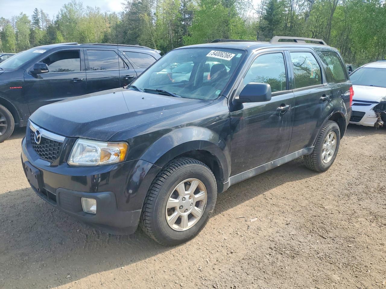 2011 Mazda Tribute Sport, VIN 4F2CY0C71BKM00946 — Minor dents and scratches