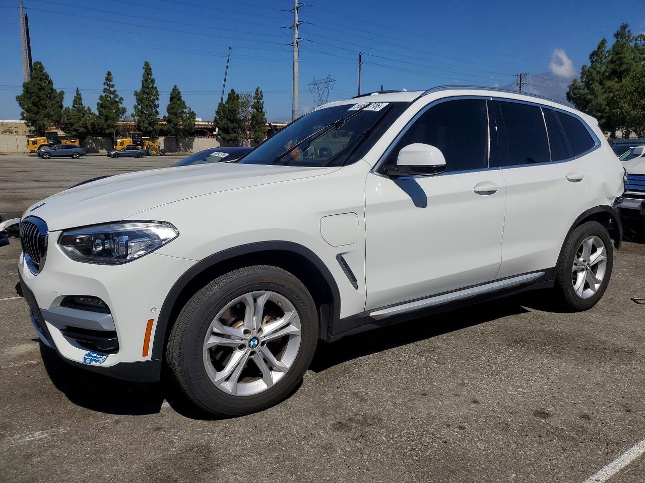 2021 BMW X3 xDrive30e, VIN 5UXTS1C04M9H04374 — Rear end