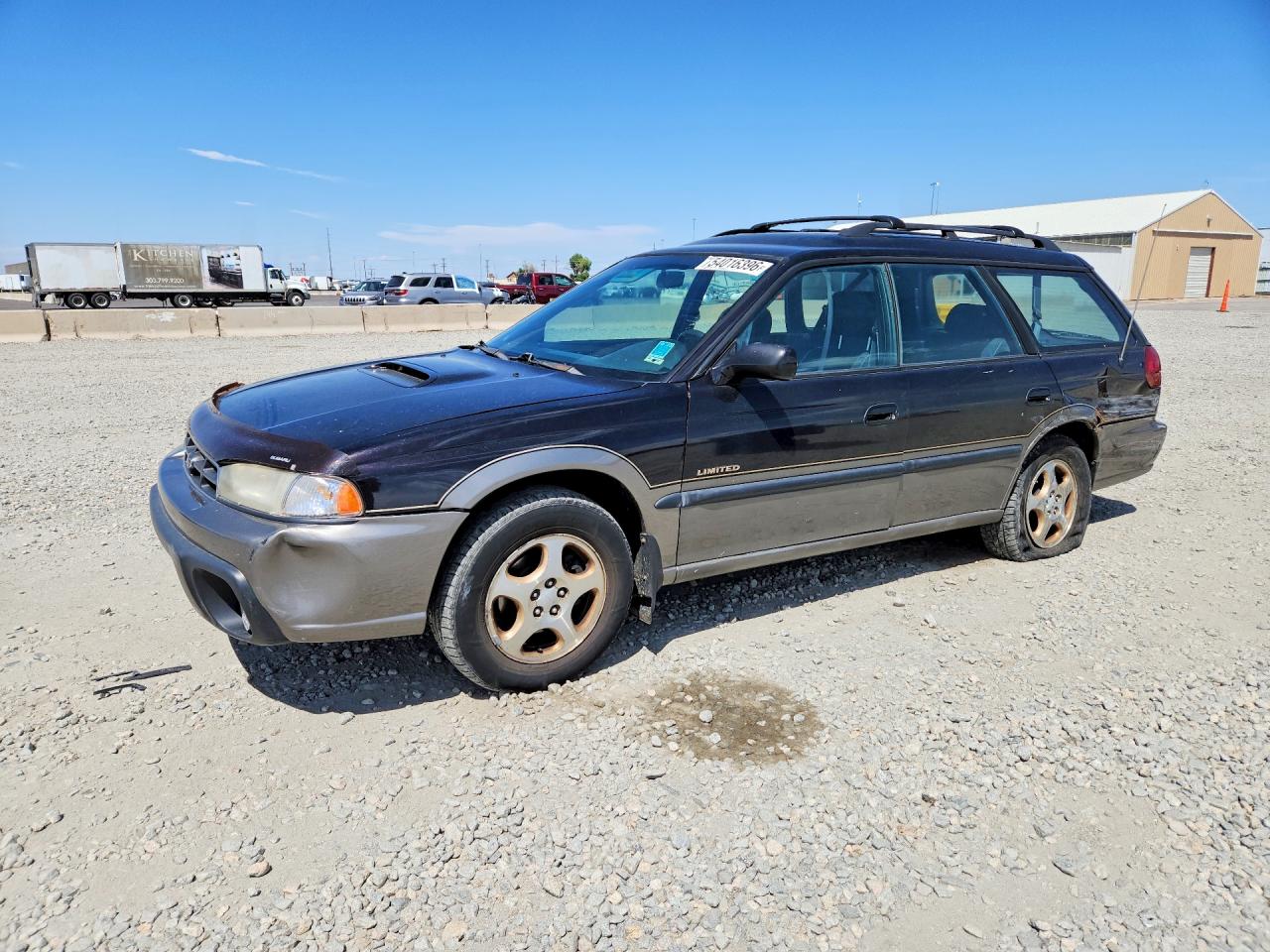 1998 Subaru Legacy Outback, VIN 4S3BG6853W7607257 — Зад