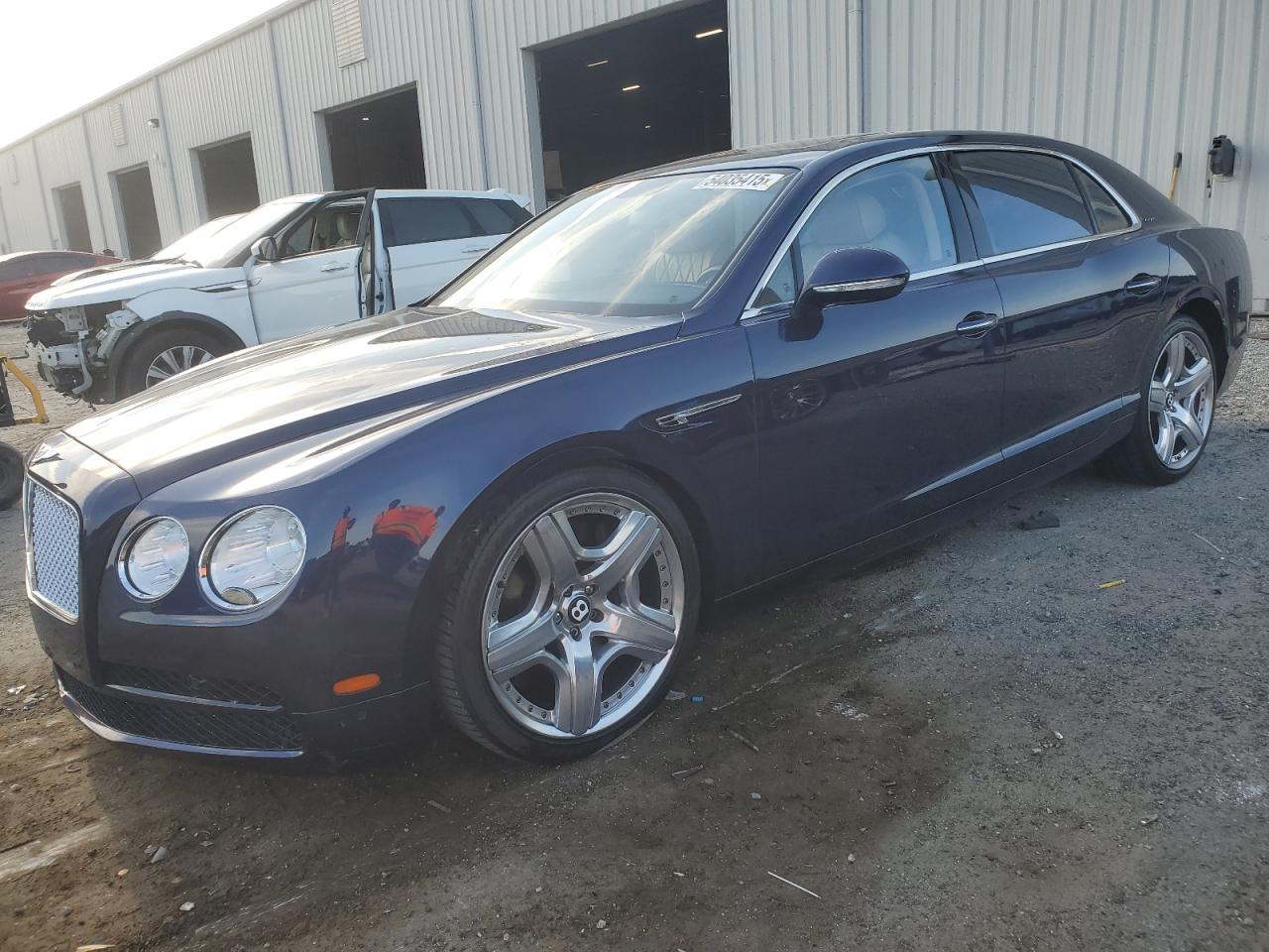 2014 Bentley Flying Spur, VIN SCBEC9ZA9EC096538 — Rear end