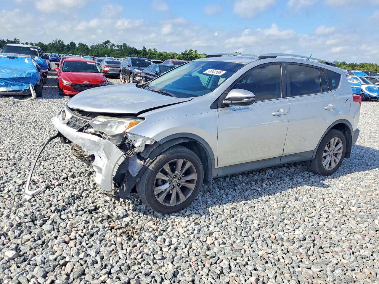 2014 Toyota RAV4 Limited, VIN 2T3DFREV0EW162335 — Side