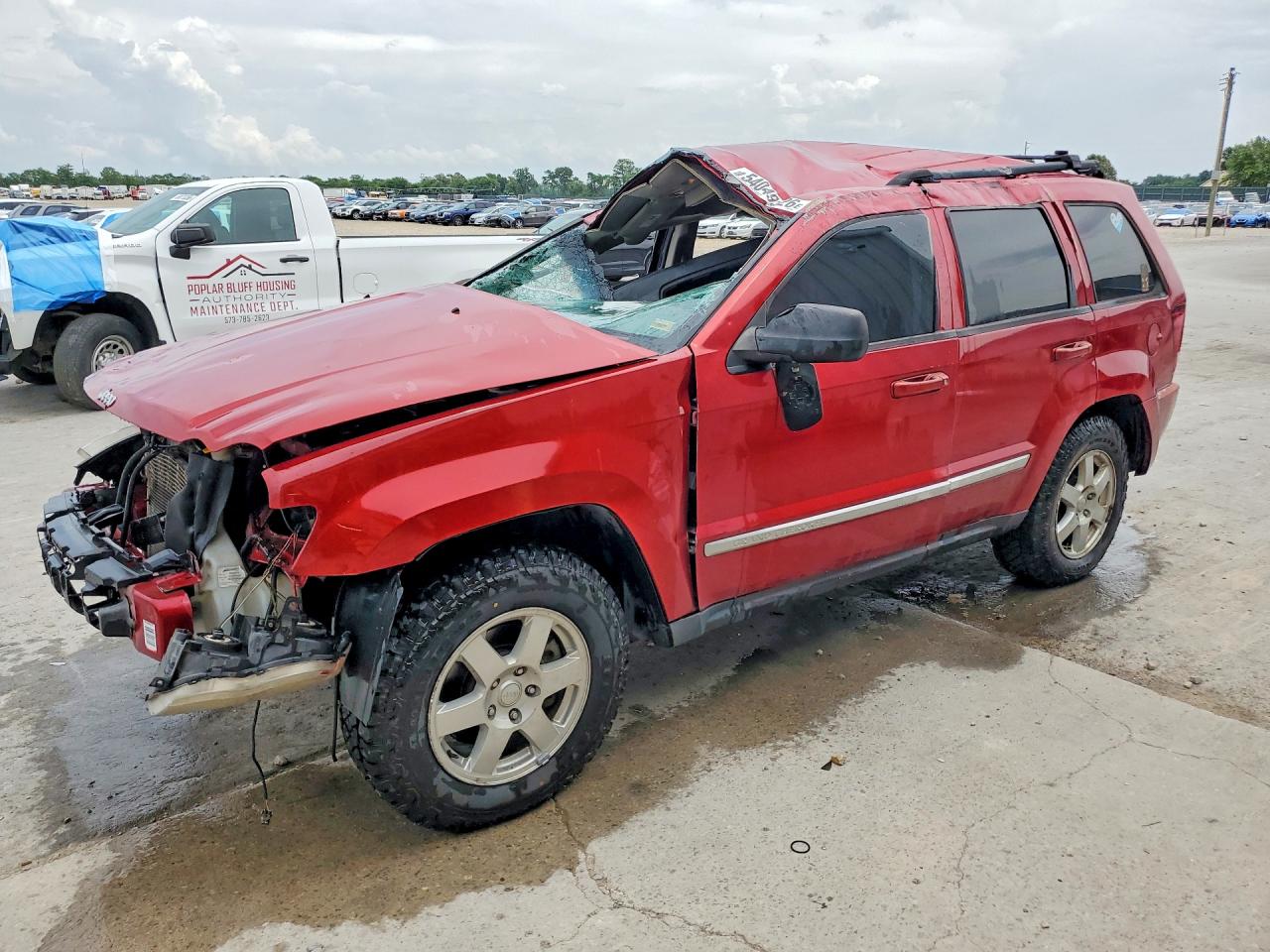 2010 Jeep Grand Cherokee Laredo, VIN 1J4PS4GK9AC124267 — Rollover