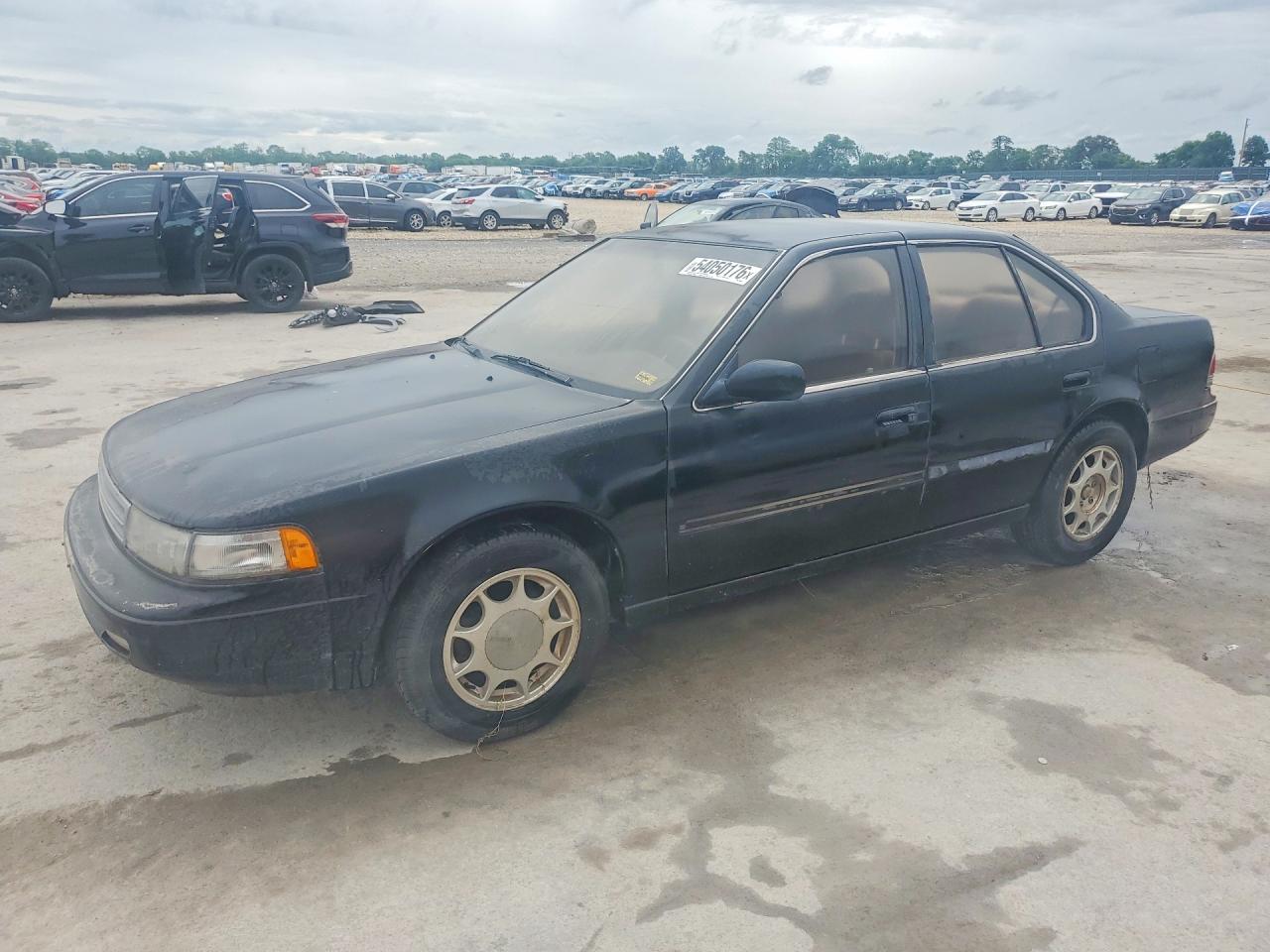 1991 Nissan Maxima, VIN JN1HJ01P2MT584842 — Бок