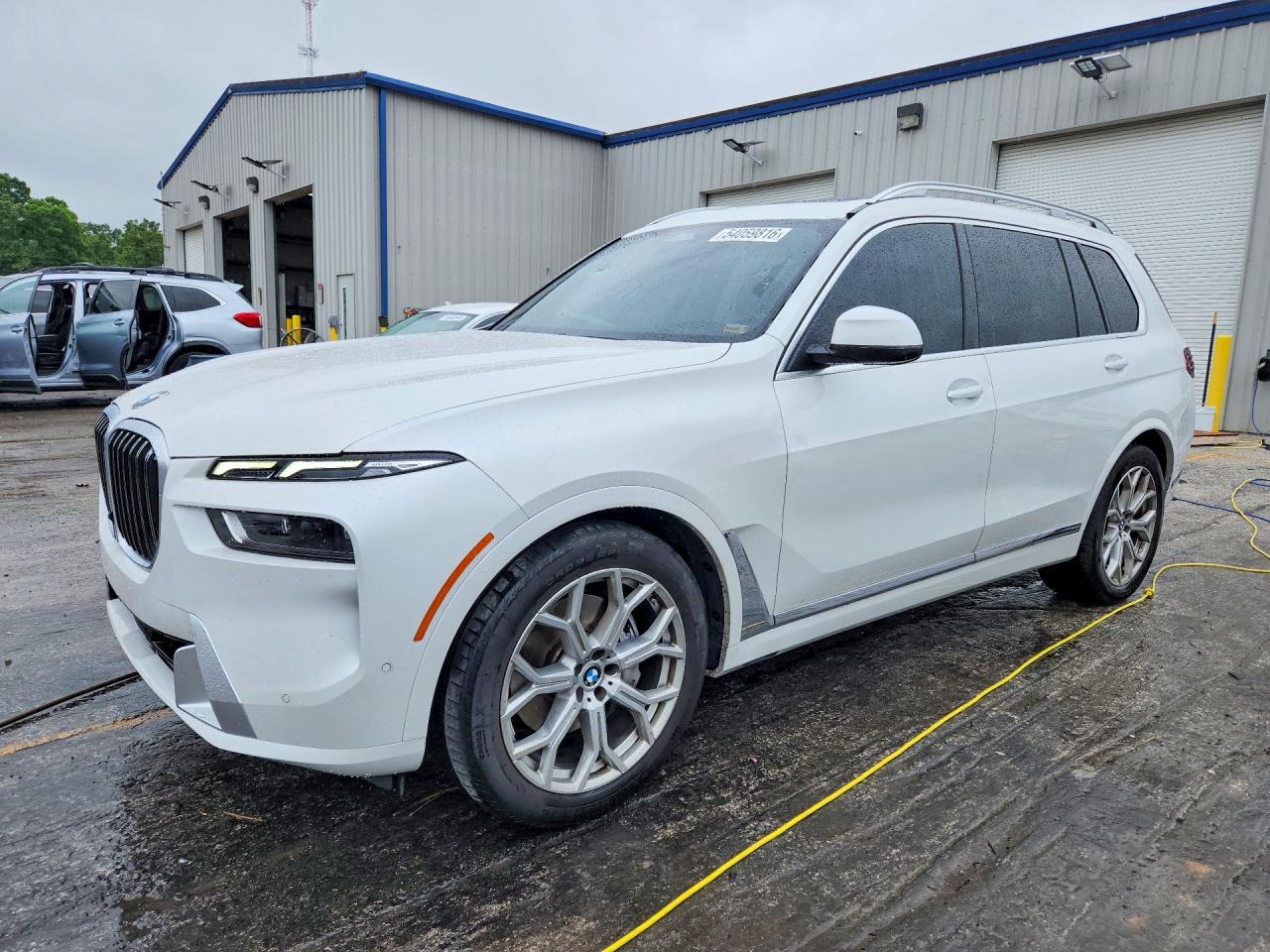 2023 BMW X7 xDrive40i, VIN 5UX23EM00P9R11019 — Hail