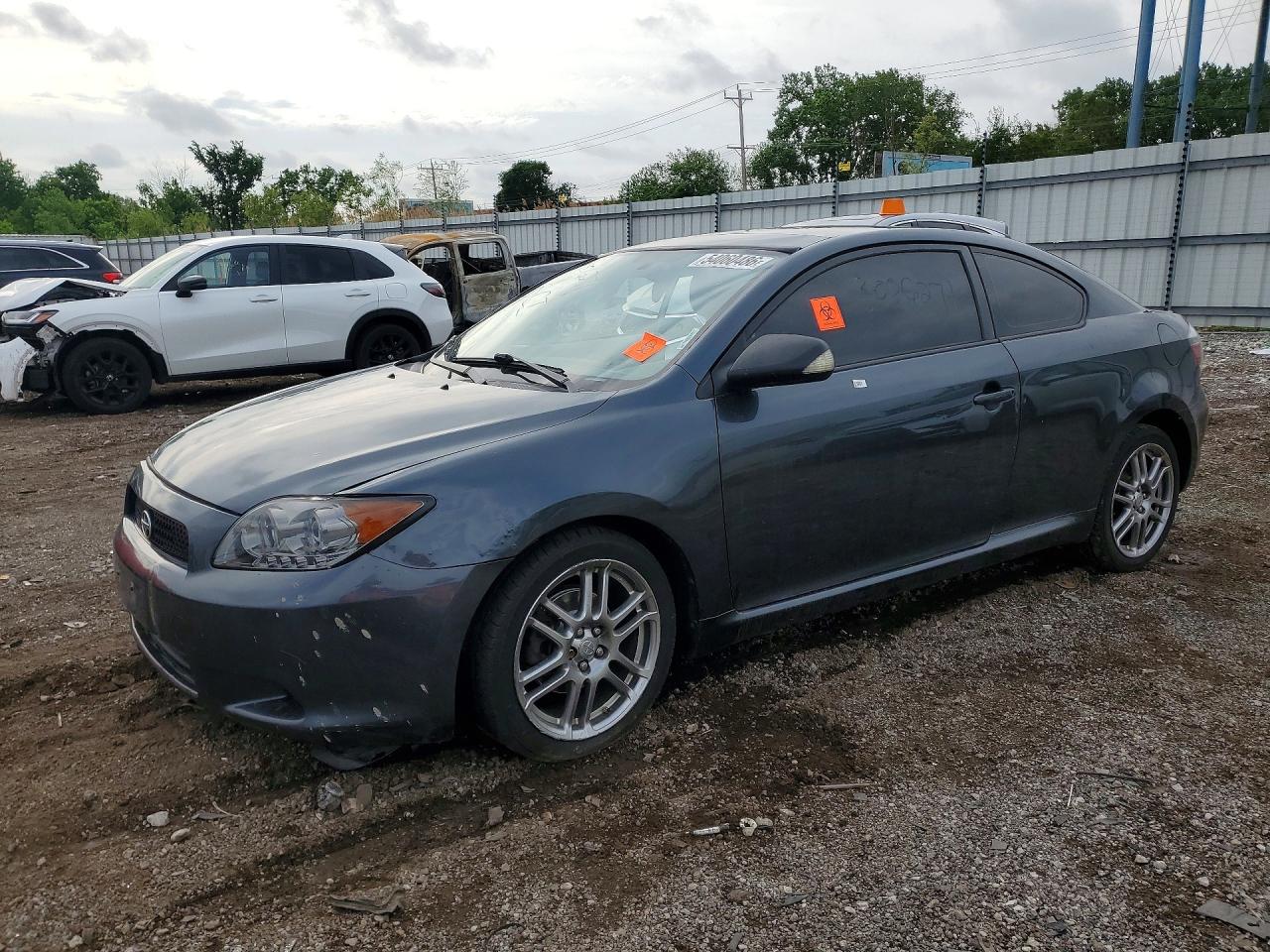 2009 Scion tC, VIN JTKDE167590299052 — Бок