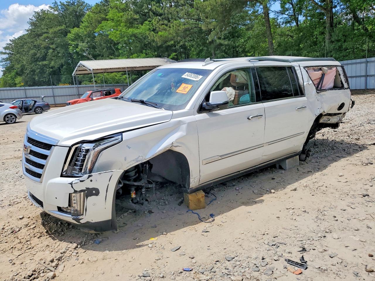 2018 Cadillac Escalade ESV Premium Luxury, VIN 1GYS3JKJ7JR218715 — Rollover