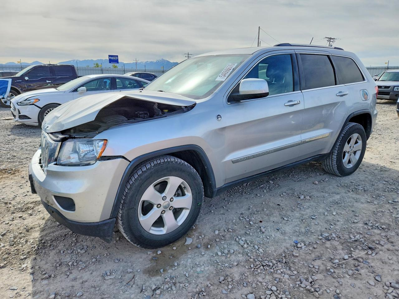 2013 Jeep Grand Cherokee Laredo, VIN 1C4RJFAG2DC502287 — Front end