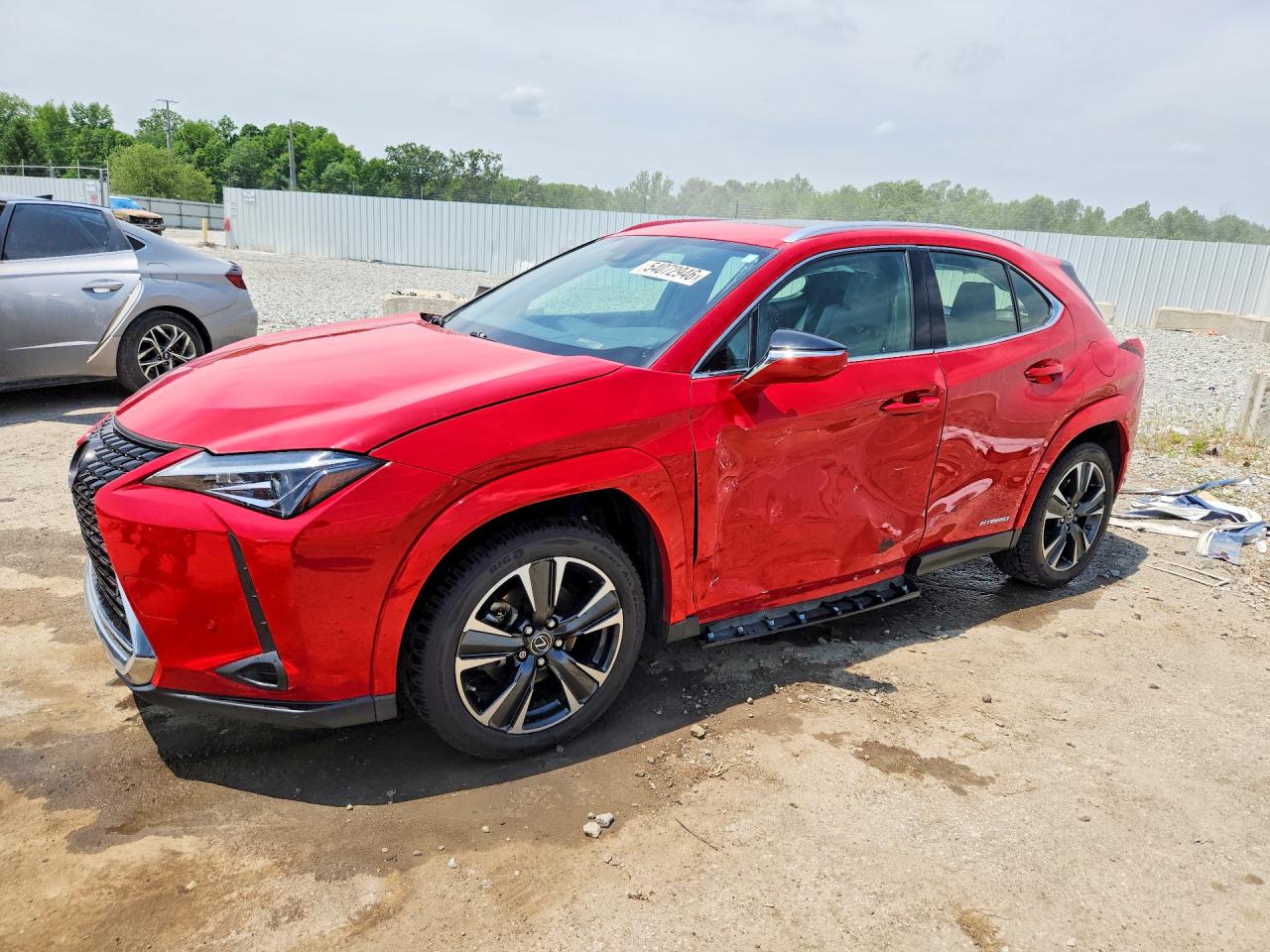 2022 Lexus UX 250h, VIN JTHP9JBH6N2060100 — Бок