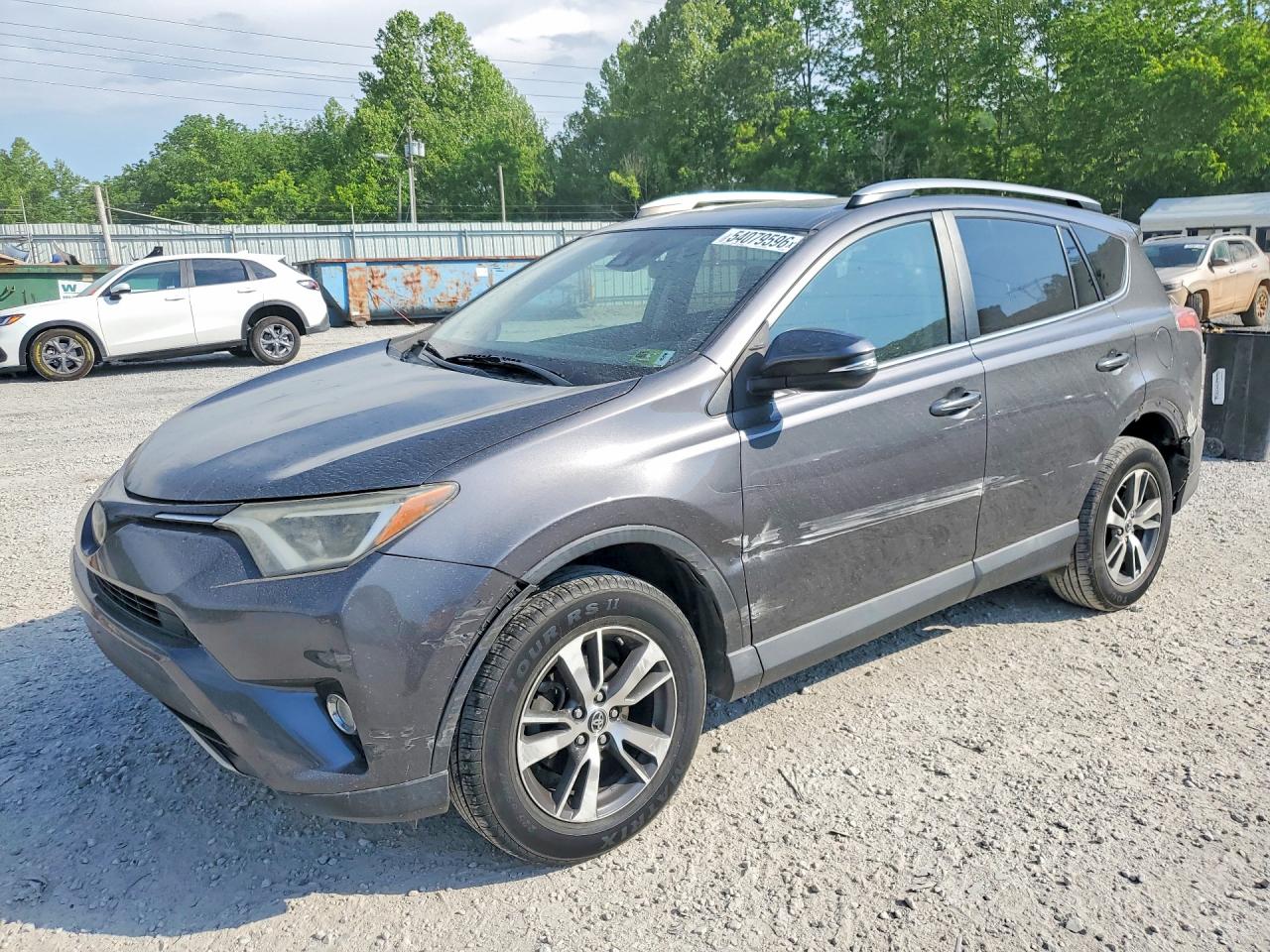 2018 Toyota RAV4 XLE, VIN 2T3RFREV6JW740065 — Side