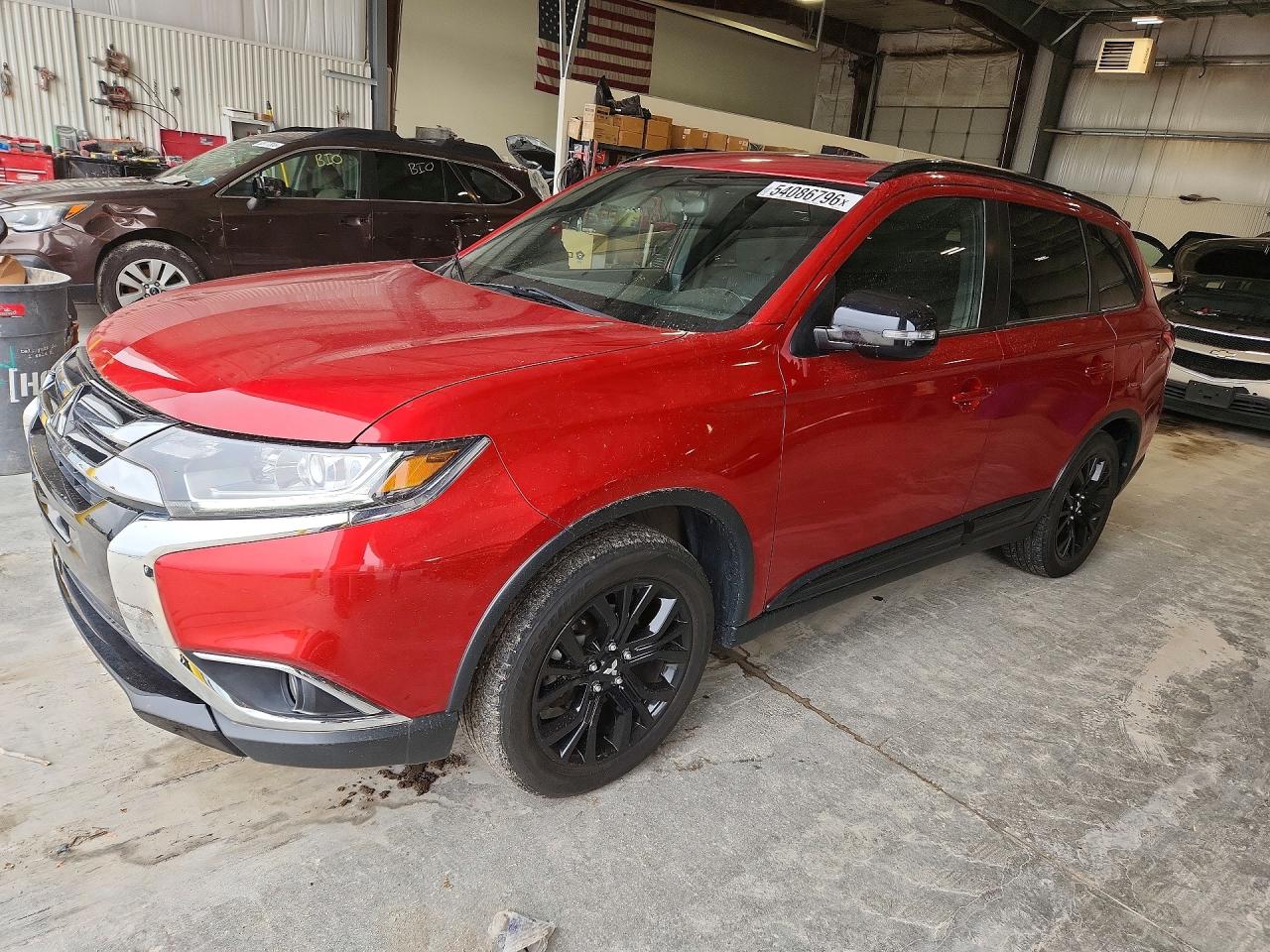 2018 Mitsubishi Outlander ES, VIN JA4AZ3A38JZ029130 — Зад