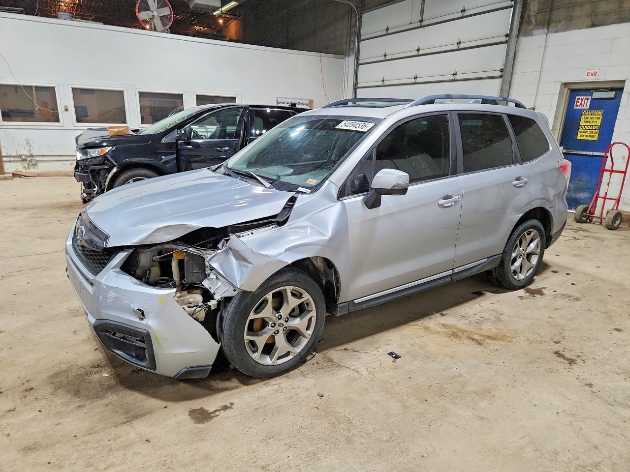 2017 Subaru Forester Touring, VIN JF2SJAWC8HH591089 — Front end