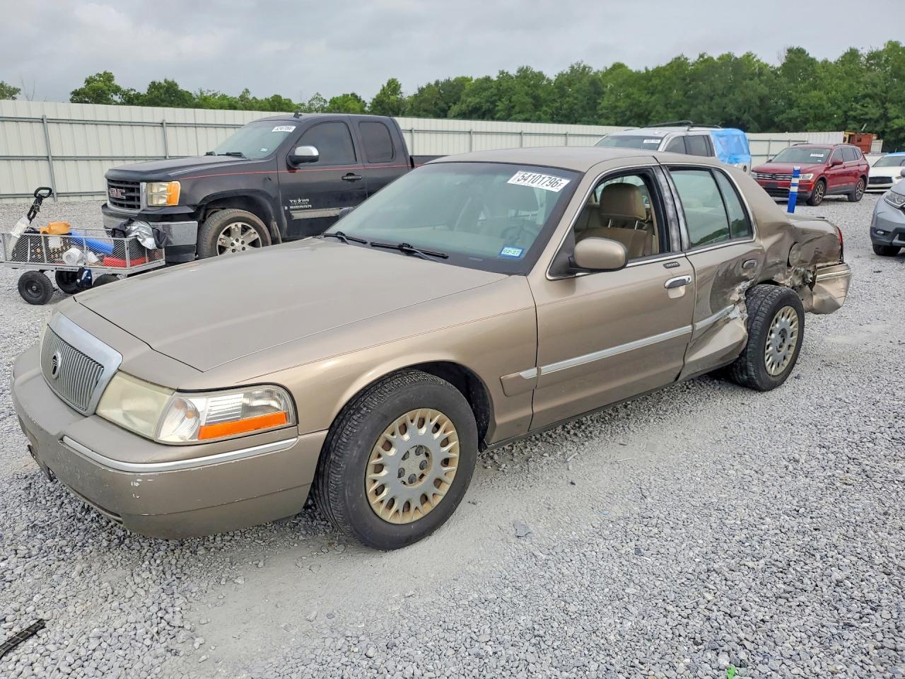 2003 Mercury Grand Marquis GS Convenience, VIN 2MEFM74W43X653599 — Rear end
