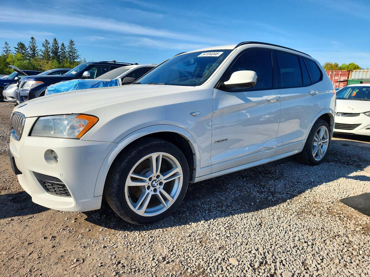 2014 BMW X3 xDrive28i, VIN 5UXWX9C53E0D16163 — Бок
