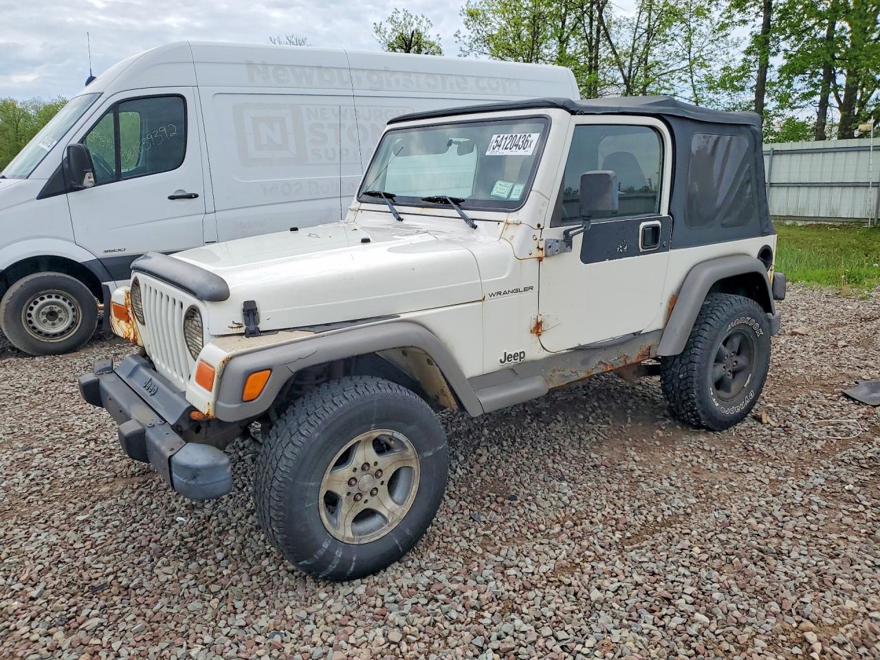 1999 Jeep Wrangler SE, VIN 1J4FY29P0XP407066 — Front end