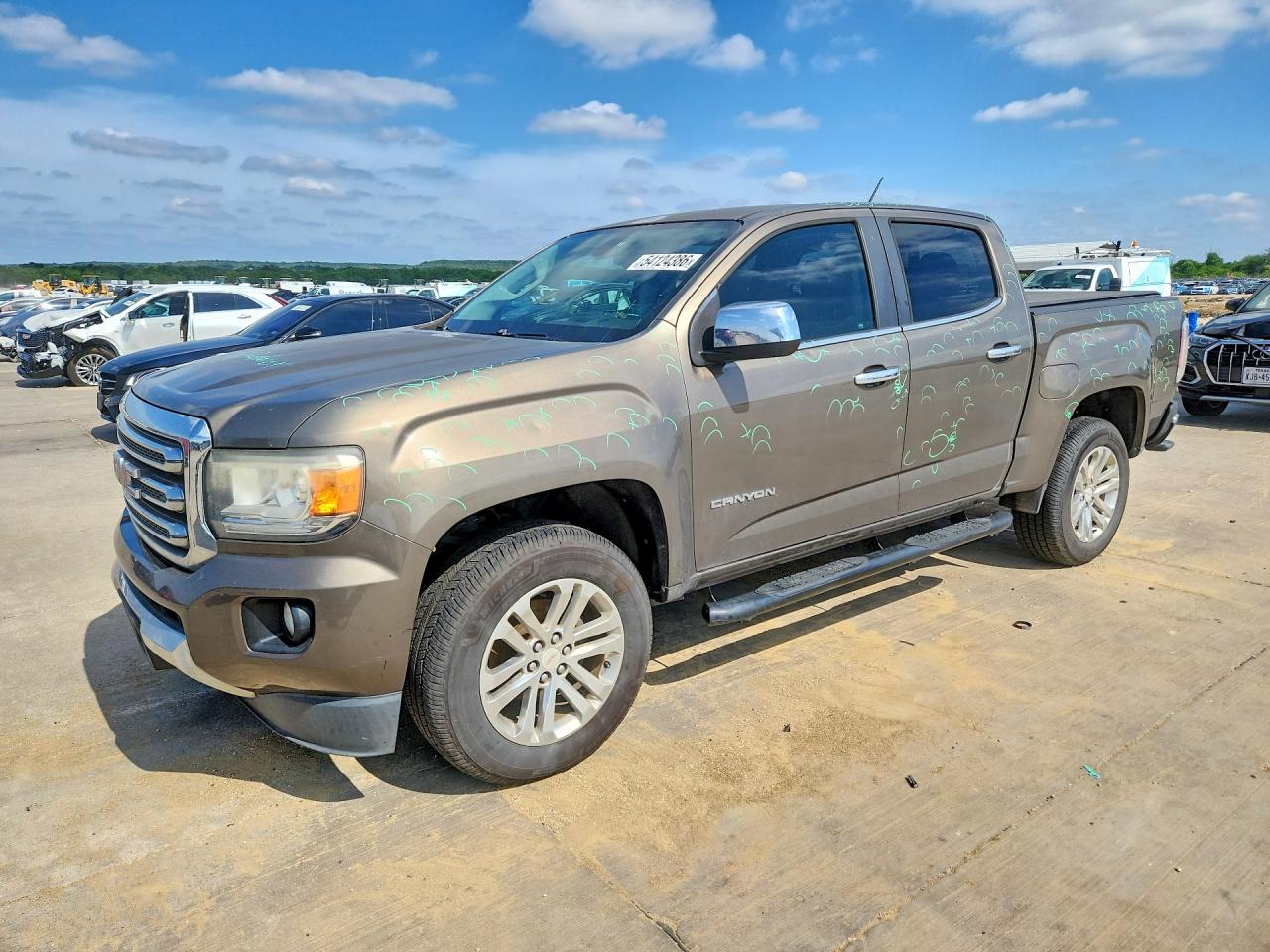 2015 GMC Canyon 2WD SLT, VIN 1GTG5CE31F1236812 — Hail