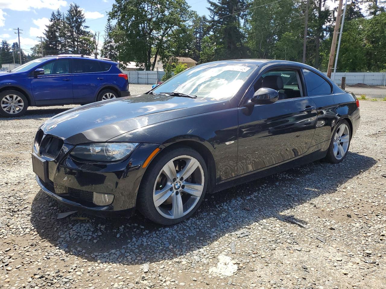2010 BMW 3 Series 335i, VIN WBAWB7C59AP048686 — Side